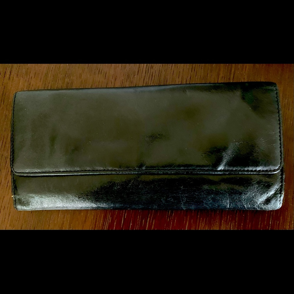 DESIGNER'S NOTE

 Hobo Lumen bifold leather wallet